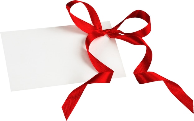 Blank card with a red ribbon tied into a bow