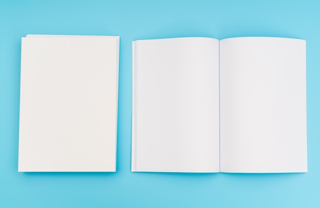 Free photo blank catalog, magazines,book mock up on blue background. .