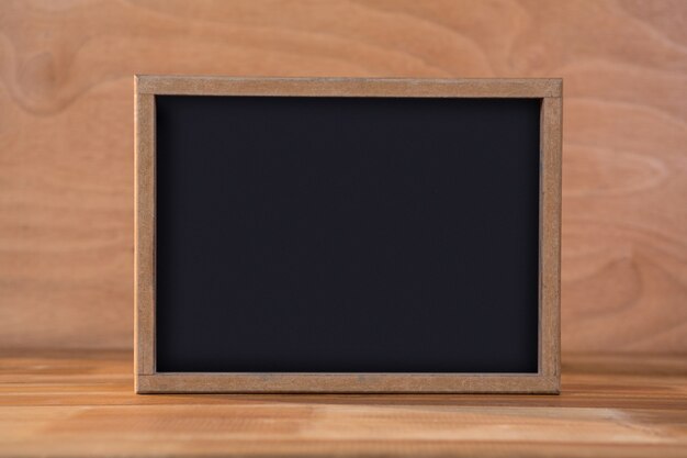 Blank chalkboard on a table