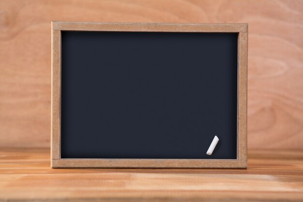 Blank chalkboard on a table