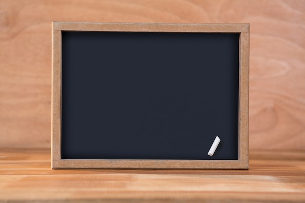 Blank chalkboard on a table