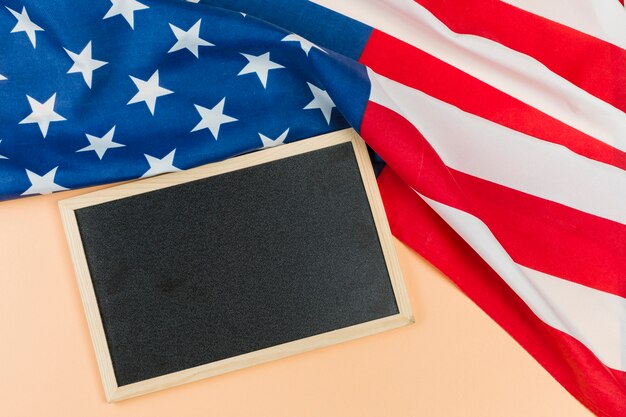 Blank chalkboard with USA flag