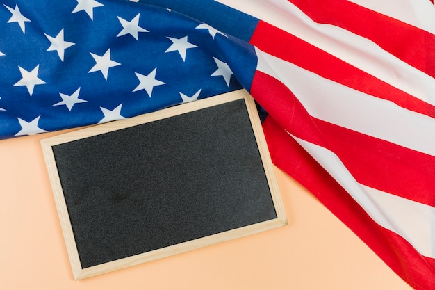 Blank chalkboard with USA flag