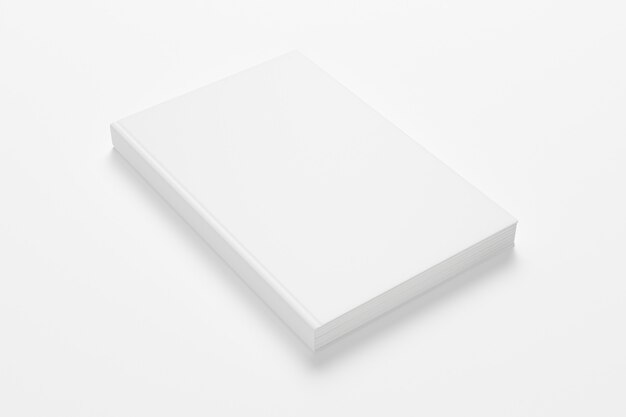 Blank closed hardcover book isolated on white.