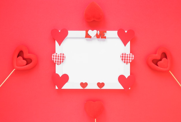 Blank frame with different hearts 