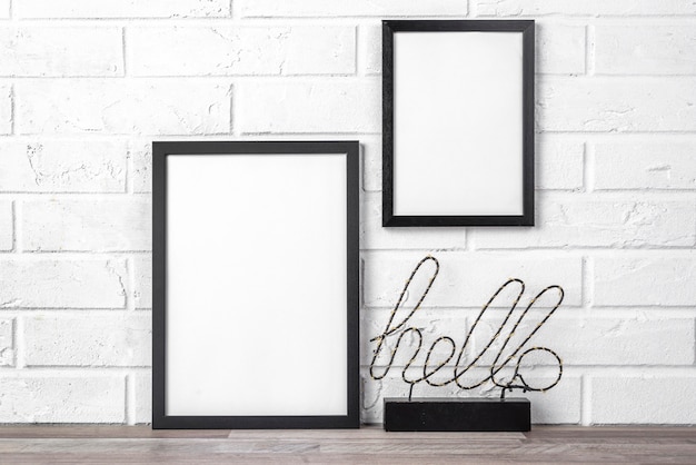 Free photo blank frame with hello sign