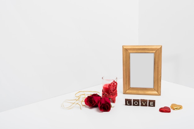 Free photo blank frame with love inscription