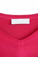 Free photo blank label on a red sweater