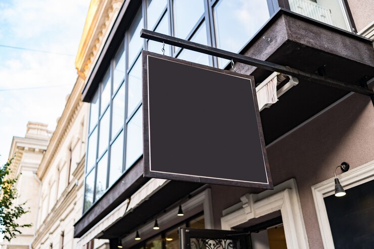 Free Photo blank mock up design of cafe signboard on nice building outdoors