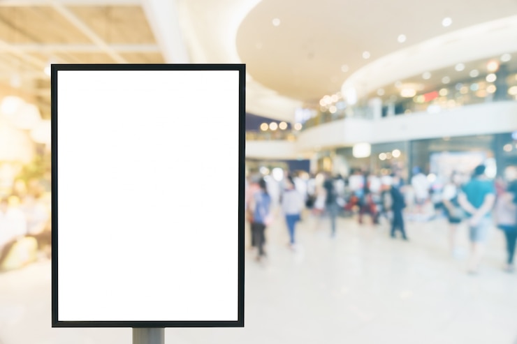 Free Photo blank mock up of vertical poster billboard.