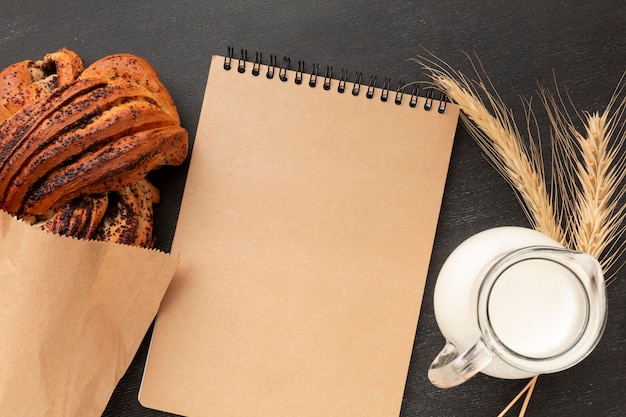 Blank notepad and bagel