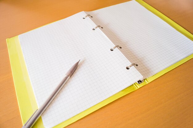 Blank notepad and pen