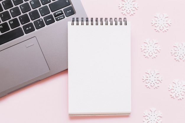 Blank notepad with small snowflakes 