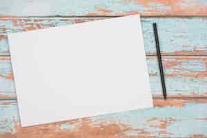 Free photo blank paper and brushes