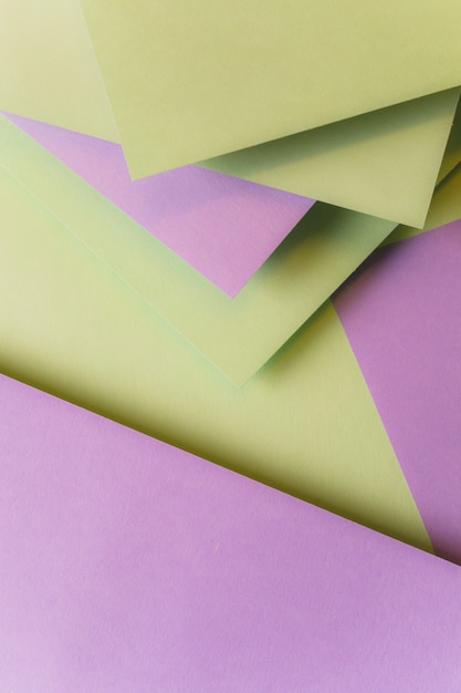 Blank paper cards layered over one another forming background
