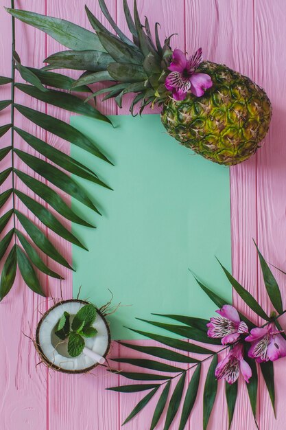 Blank paper and delicious fruits on wooden surface