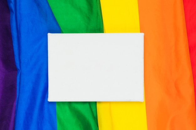 Blank paper on rainbow flag