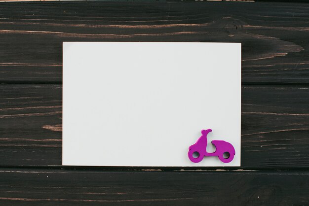 Blank paper sheet with small scooter 