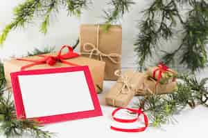 Free photo blank paper with gift boxes