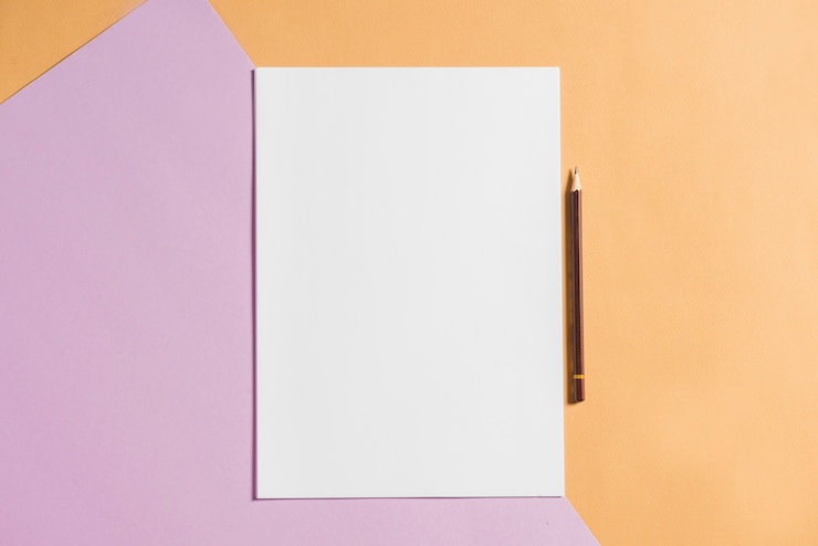 Free Photo blank paper with pencil on colorful card papers