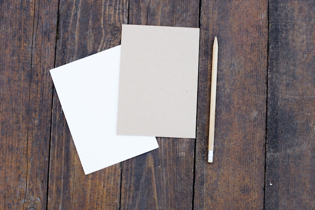 Free photo blank paper with pencil.