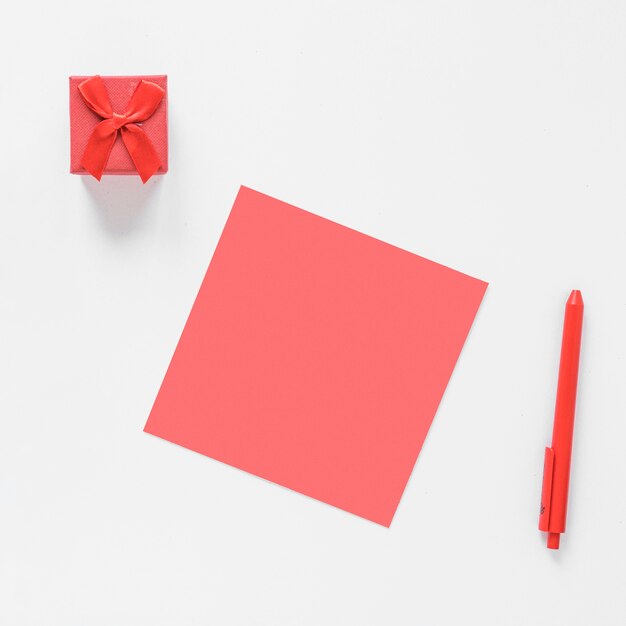 Blank paper with small gift box 