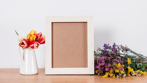 Blank photo holder and blossoms
