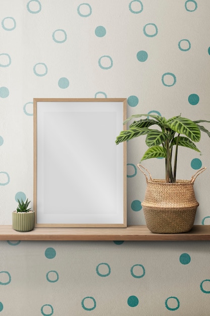 Free photo blank picture frame on a shelf