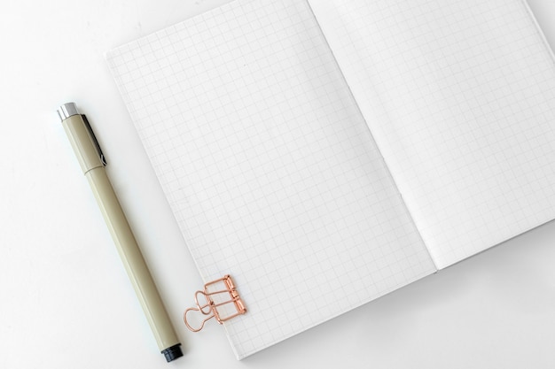 Blank plain notebook page with stationary