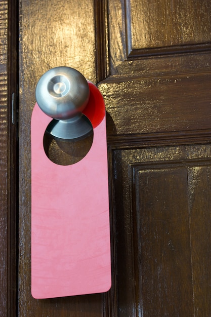 Blank sign hanging on the door