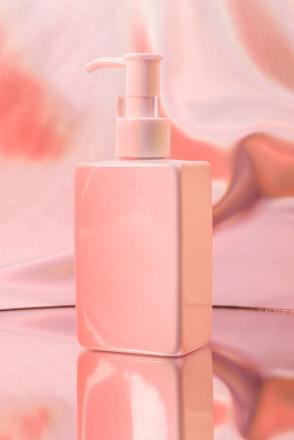 Free photo blank skincare white pump bottle with pink neon light