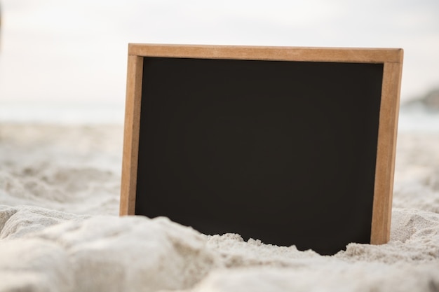 Free photo blank slate in sand