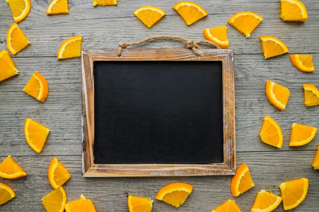 Blank slate surrounded by orange pieces