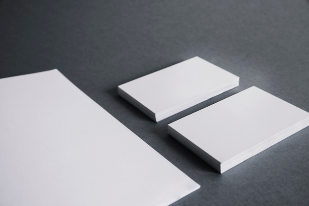 Free photo blank stationery concept with two stacks of business cards