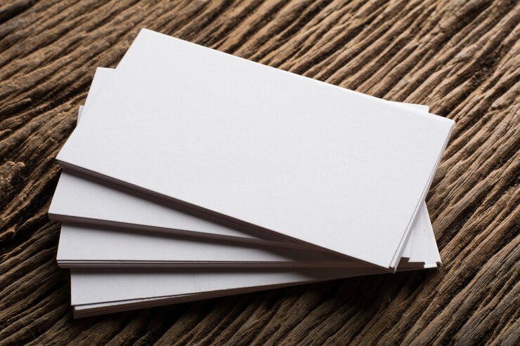 Free Photo blank white business card presentation of corporate identity on wood background