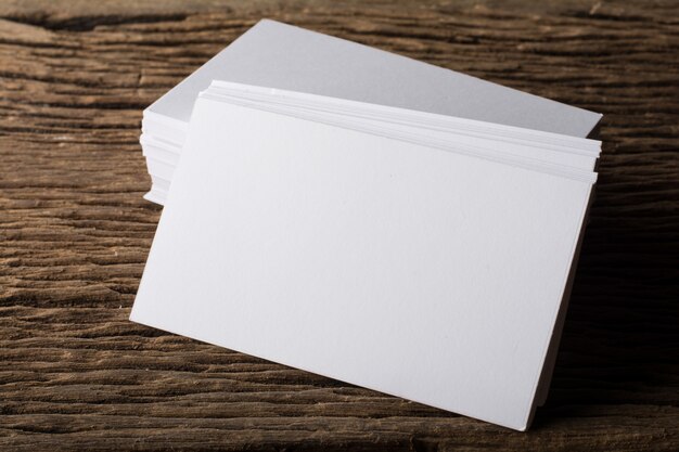 Blank white Business card presentation of Corporate identity on wood background