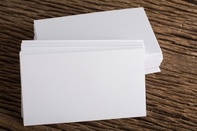 Blank white Business card presentation of Corporate identity on wood background