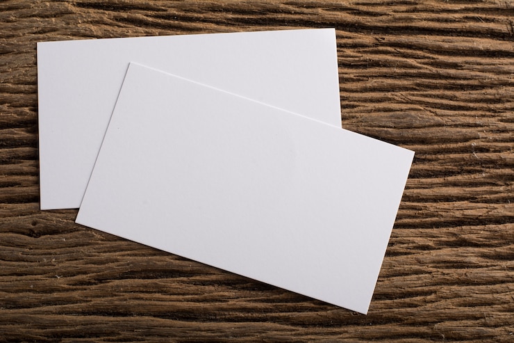 Free Photo blank white business card presentation of corporate identity on wood background