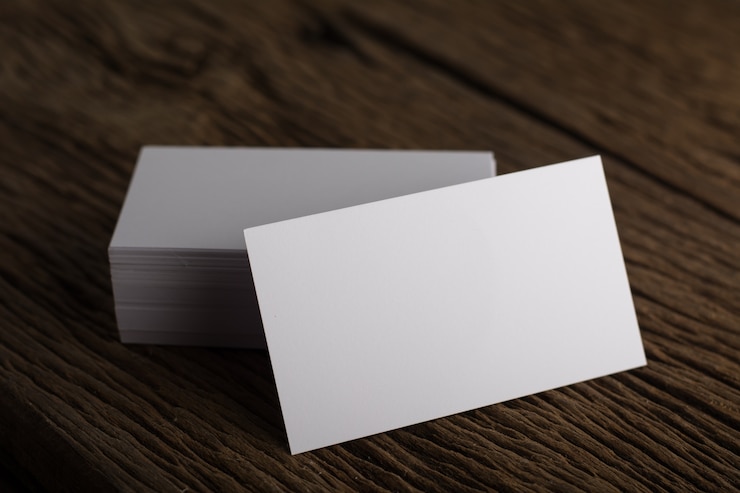 Free Photo blank white business card presentation of corporate identity on wood background