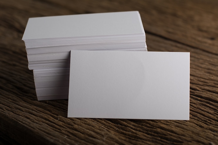 Free Photo blank white business card presentation of corporate identity on wood background