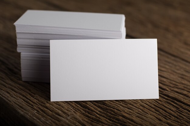 Blank white Business card presentation of Corporate identity on wood background
