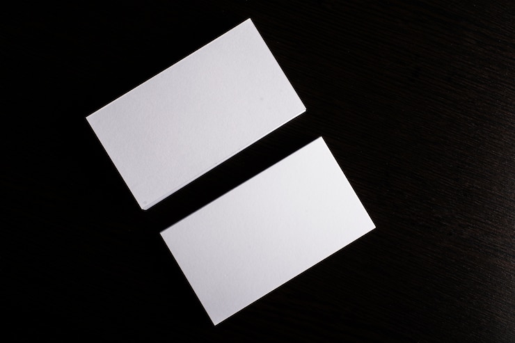 Free Photo blank white business card presentation of corporate identity on wood background