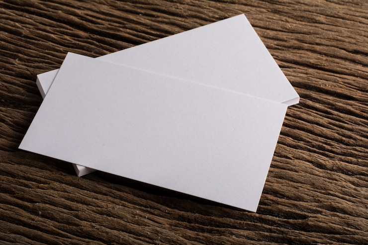 Free Photo blank white business card presentation of corporate identity on wood background