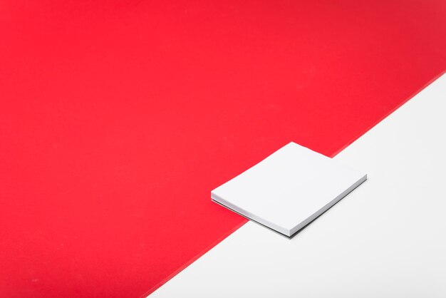 Blank white notepad on light table