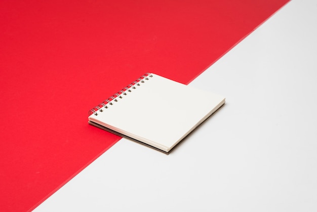 Free photo blank white notepad on table