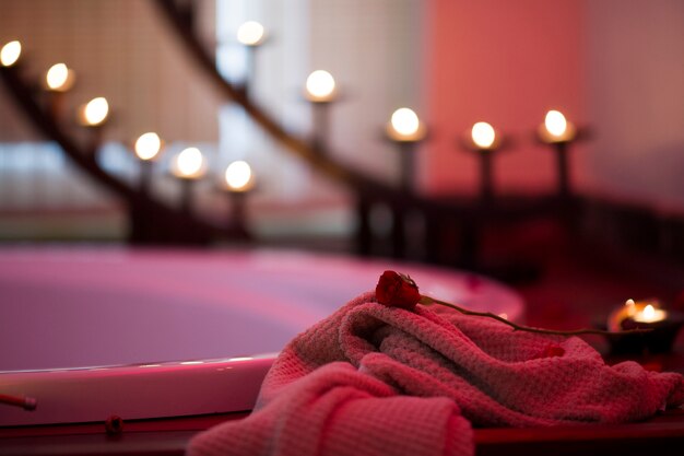 Blanket with red rose and blurred background