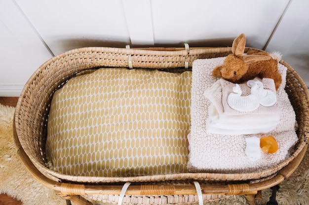 Blankets and toy in carrycot