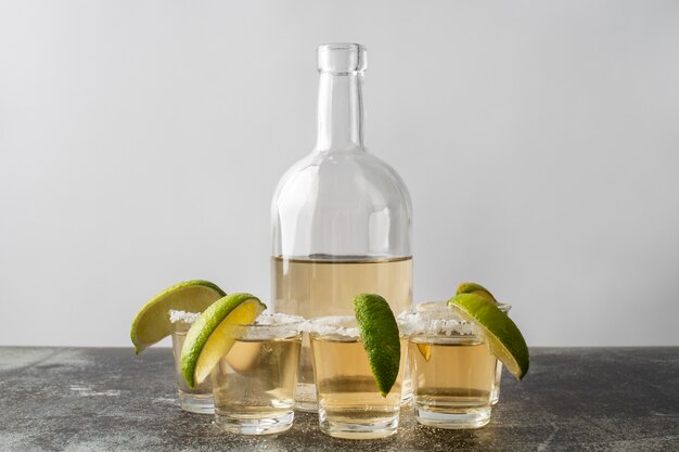 Blend of cocktails in glasses with lime and salty rims