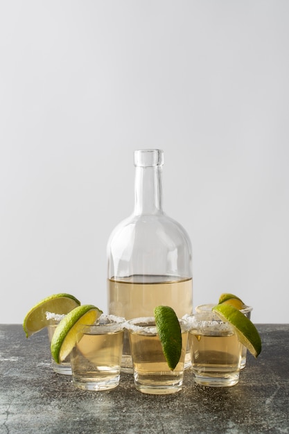 Blend of cocktails in glasses with lime and salty rims