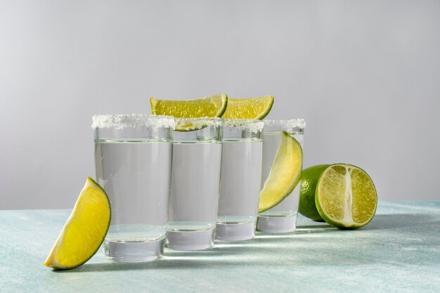 Blend of refreshing cocktails with lime slices